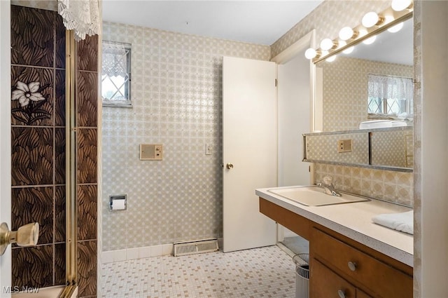 24622 Mitchell Dr, North Olmsted, OH 44070 - bathroom with vanity, wallpapered walls, plenty of natural light, and tile patterned floors