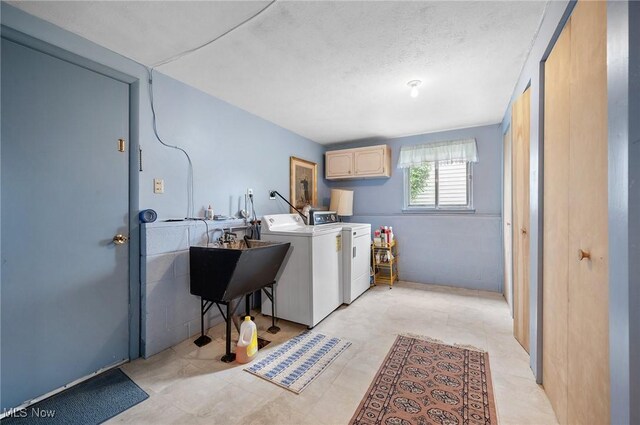 24622 Mitchell Dr, North Olmsted, OH 44070 - washroom featuring cabinet space and independent washer and dryer