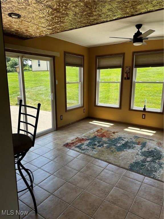 54431 Maple Ln, Martins Ferry, OH 43935 - doorway with an ornate ceiling, a ceiling fan, and tile patterned floors