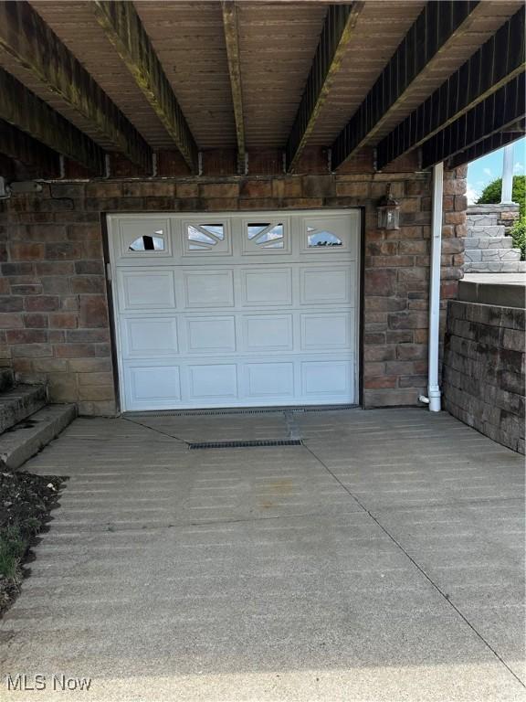 54431 Maple Ln, Martins Ferry, OH 43935 - garage featuring driveway