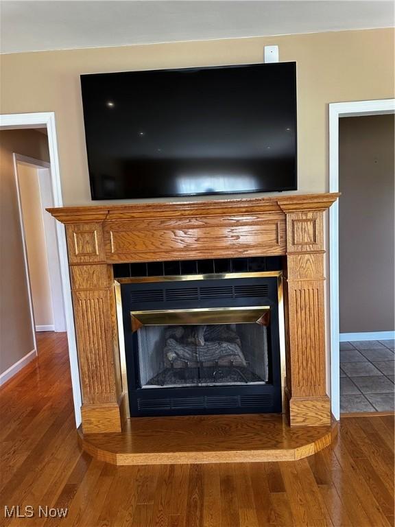 54431 Maple Ln, Martins Ferry, OH 43935 - detailed view of a fireplace and wood finished floors