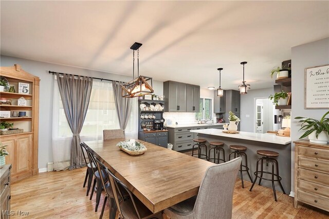 661 Wynne Dr, Coventry, OH 44319 - dining space featuring light wood-style flooring