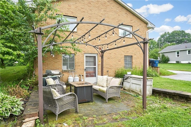 661 Wynne Dr, Coventry, OH 44319 - view of patio featuring an outdoor living space with a fire pit and area for grilling