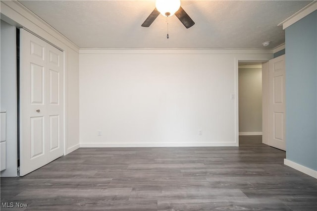 2364 Earl, Niles, OH 44446 - unfurnished bedroom featuring a closet, wood finished floors, ceiling fan, ornamental molding, and a textured ceiling