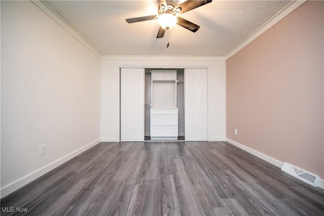 2364 Earl, Niles, OH 44446 - unfurnished bedroom with ornamental molding, dark wood finished floors, a closet, and a ceiling fan