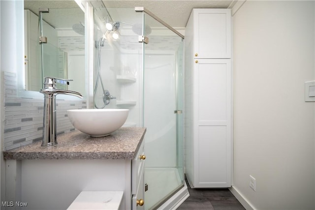 2364 Earl, Niles, OH 44446 - full bathroom with decorative backsplash, a stall shower, wood finished floors, and vanity