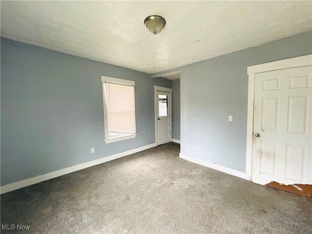 1200 E 125th St, Cleveland, OH 44112 - carpeted spare room with baseboards
