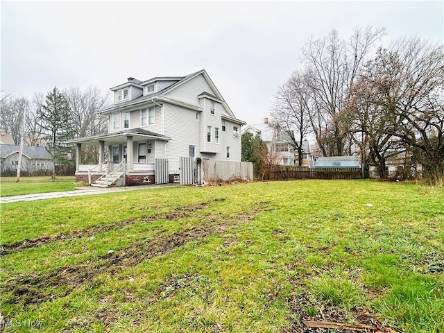 1200 E 125th St, Cleveland, OH 44112 - view of home's exterior with a porch