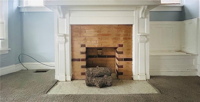 1200 E 125th St, Cleveland, OH 44112 - detailed view of a brick fireplace and carpet flooring