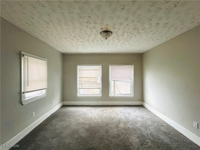 1200 E 125th St, Cleveland, OH 44112 - unfurnished room featuring carpet floors and a textured ceiling