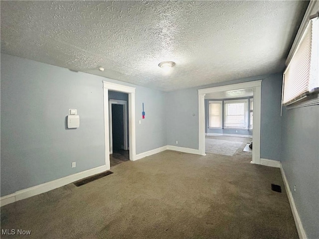 1200 E 125th St, Cleveland, OH 44112 - unfurnished room featuring carpet floors and a textured ceiling