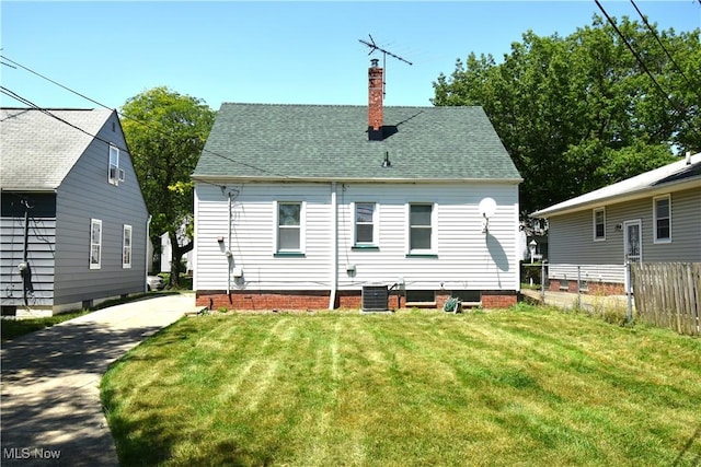 14514 Krems Ave, Maple Heights, OH 44137 - rear view of house featuring a chimney