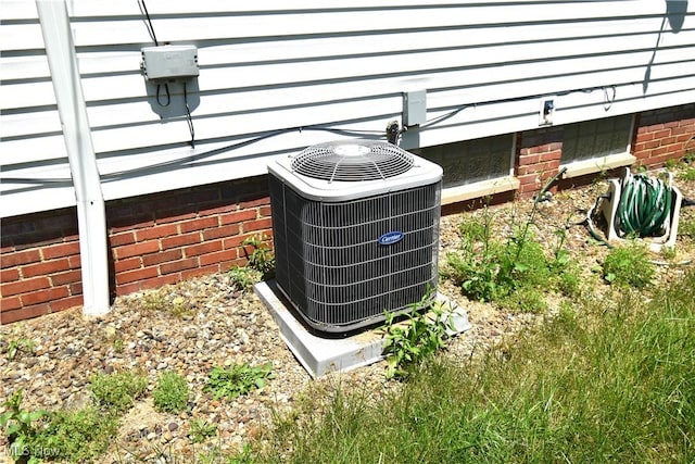 14514 Krems Ave, Maple Heights, OH 44137 - exterior view of a cooling unit and crawl space