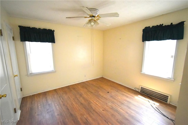 14514 Krems Ave, Maple Heights, OH 44137 - empty room featuring wood finished floors and a ceiling fan