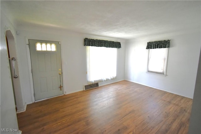 14514 Krems Ave, Maple Heights, OH 44137 - foyer entrance featuring wood finished floors and arched walkways