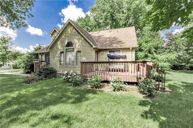 836 Arboretum Cir, Sagamore Hills, OH 44067 - back of house featuring a deck, a lawn, and a shingled roof