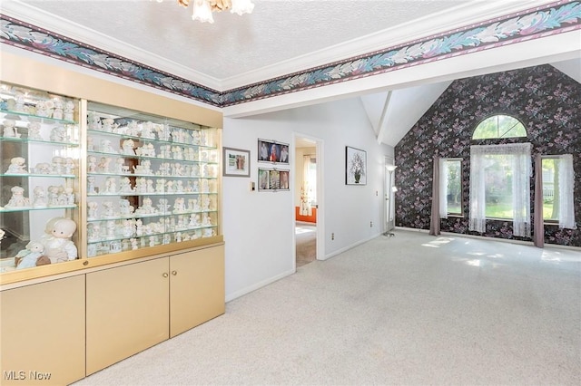 836 Arboretum Cir, Sagamore Hills, OH 44067 - hall featuring vaulted ceiling, carpet, a chandelier, wallpapered walls, and ornamental molding