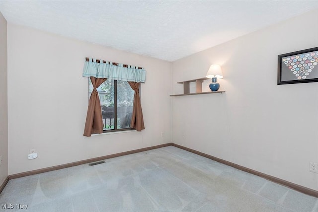 836 Arboretum Cir, Sagamore Hills, OH 44067 - carpeted empty room featuring baseboards and a textured ceiling