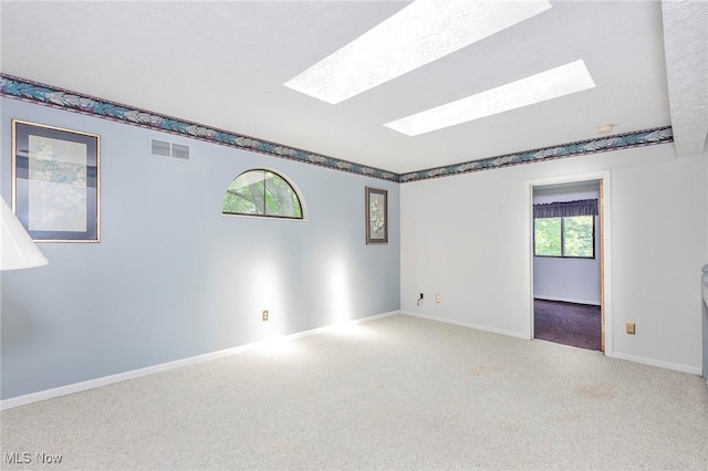 836 Arboretum Cir, Sagamore Hills, OH 44067 - unfurnished room featuring a skylight and carpet flooring