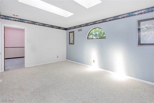 836 Arboretum Cir, Sagamore Hills, OH 44067 - empty room featuring a skylight and carpet