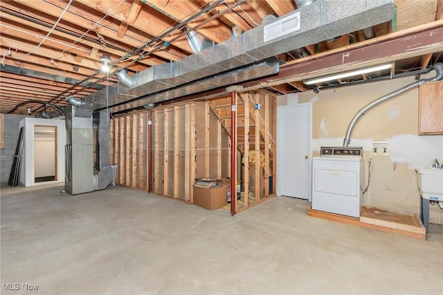 836 Arboretum Cir, Sagamore Hills, OH 44067 - unfinished basement featuring washer / dryer and heating unit