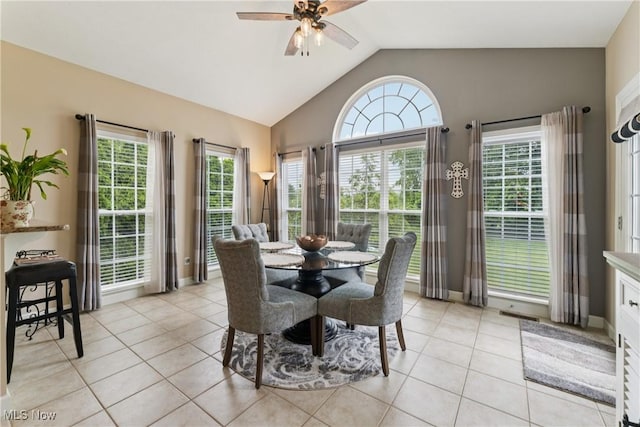 3281 Evans Way, Twinsburg, OH 44087 - dining space featuring light tile patterned floors, a ceiling fan, vaulted ceiling, and plenty of natural light