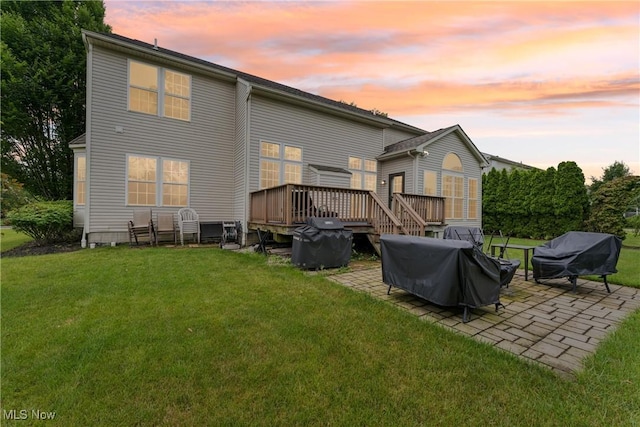 3281 Evans Way, Twinsburg, OH 44087 - rear view of property featuring a deck, a patio area, and a lawn