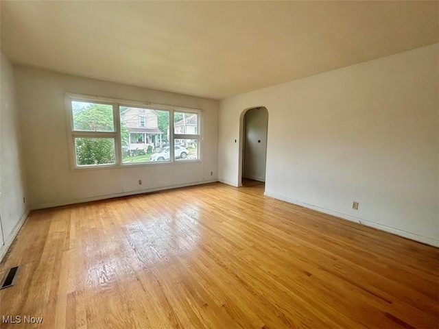 116 Euclid Pl, Marietta, OH 45750 - spare room with arched walkways and light wood-style floors