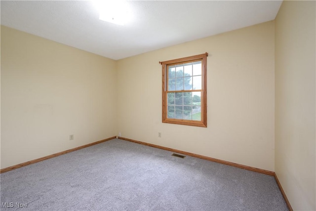 2811 Canton Rd, Uniontown, OH 44685 - unfurnished room with carpet flooring