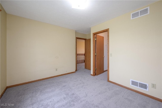 2811 Canton Rd, Uniontown, OH 44685 - empty room featuring carpet and baseboards