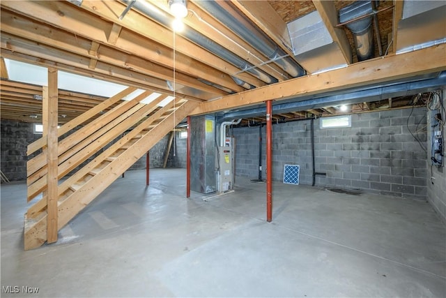 2811 Canton Rd, Uniontown, OH 44685 - unfinished basement featuring stairs