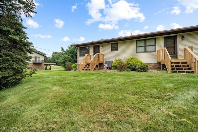 1222 Schneiders Crossing Rd NW # C, Dover, OH 44622 - back of house featuring a lawn