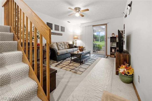 1222 Schneiders Crossing Rd NW # C, Dover, OH 44622 - living room featuring carpet floors, stairs, and ceiling fan