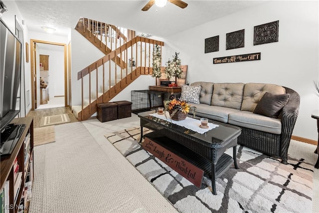 1222 Schneiders Crossing Rd NW # C, Dover, OH 44622 - living area with light colored carpet, stairs, and a ceiling fan