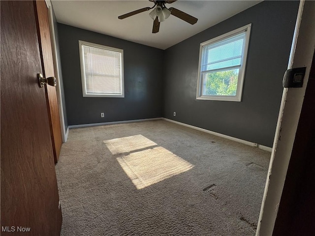 14782 Hametown Rd, Doylestown, OH 44230 - carpeted spare room featuring a ceiling fan and baseboards