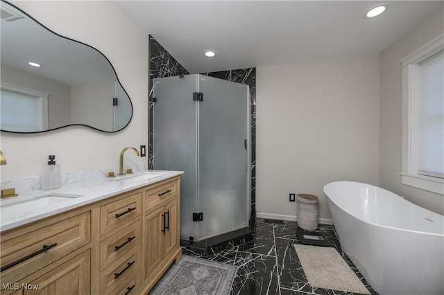 4216 Stone Creek Rd SW, Stone Creek, OH 43840 - bathroom featuring marble tiled floors, a shower stall, double vanity, recessed lighting, and a soaking tub