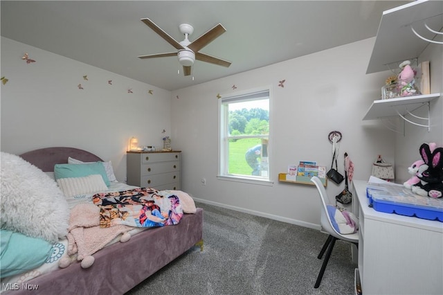4216 Stone Creek Rd SW, Stone Creek, OH 43840 - carpeted bedroom with a ceiling fan and baseboards