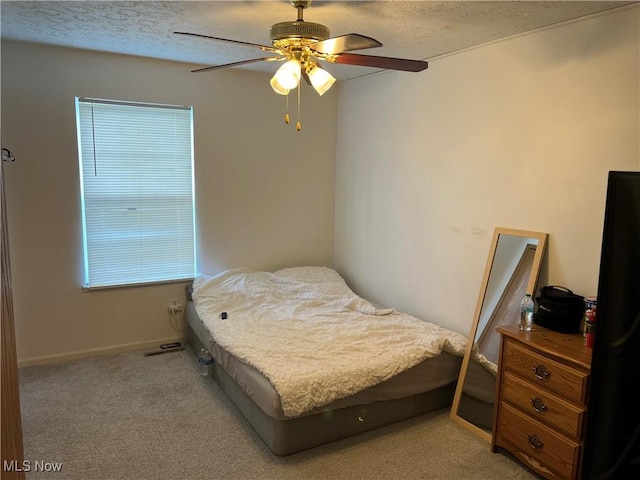 678 Highland Dr, Lodi, OH 44254 - bedroom with a textured ceiling, light carpet, and ceiling fan