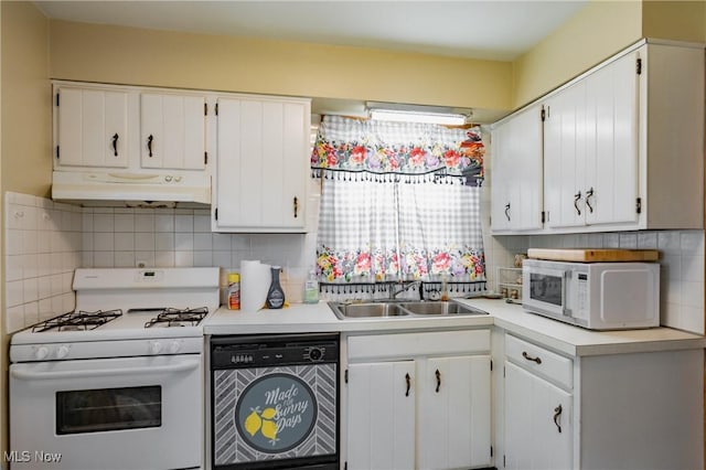 1055 W Virginia Ave, Parkersburg, WV 26104 - kitchen with white appliances, under cabinet range hood, white cabinetry, and light countertops