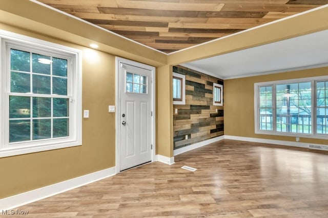 2968 Hayne Rd, Akron, OH 44312 - foyer entrance with wood ceiling, wood finished floors, and crown molding