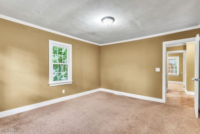 2968 Hayne Rd, Akron, OH 44312 - carpeted spare room with plenty of natural light and crown molding