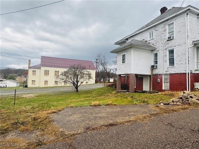 625 Main St, Caldwell, OH 43724 - view of home's exterior with cooling unit