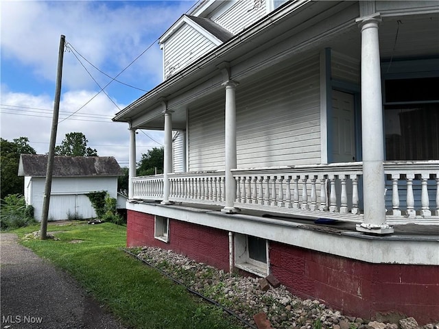 625 Main St, Caldwell, OH 43724 - view of home's exterior with a porch