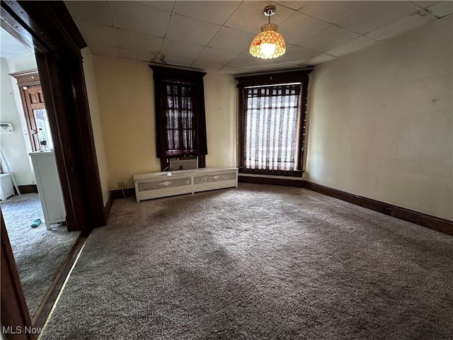 625 Main St, Caldwell, OH 43724 - carpeted spare room with a paneled ceiling