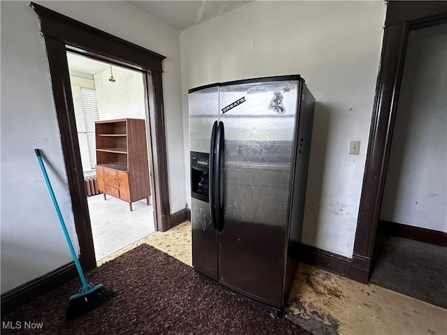 625 Main St, Caldwell, OH 43724 - kitchen with fridge with ice dispenser and concrete floors