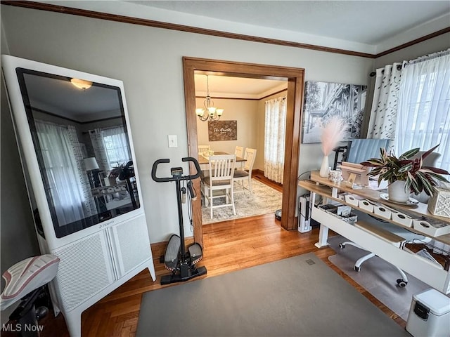 2208 Oak St, Parkersburg, WV 26101 - office featuring ornamental molding, a chandelier, and wood finished floors