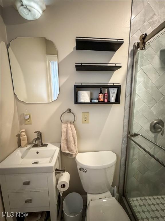 2208 Oak St, Parkersburg, WV 26101 - bathroom featuring vanity and a shower stall