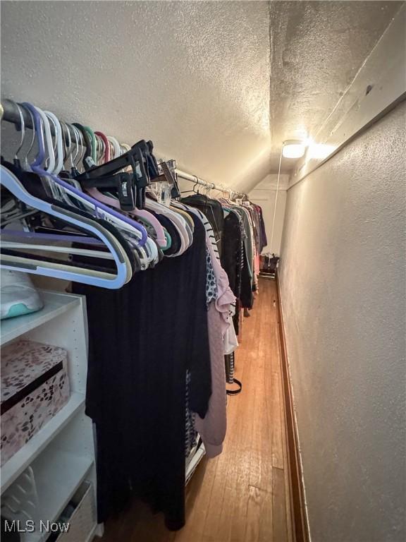 2208 Oak St, Parkersburg, WV 26101 - walk in closet with hardwood / wood-style floors and vaulted ceiling
