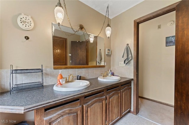 1781 Old Forge Rd, Mogadore, OH 44260 - full bathroom featuring double vanity and tasteful backsplash