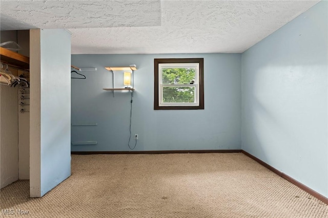 1781 Old Forge Rd, Mogadore, OH 44260 - unfurnished bedroom featuring carpet flooring and a textured ceiling